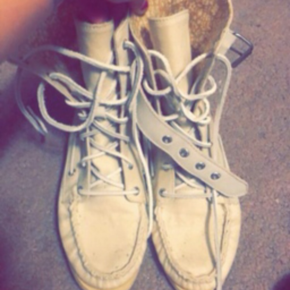 Sperry tan top sider boots.